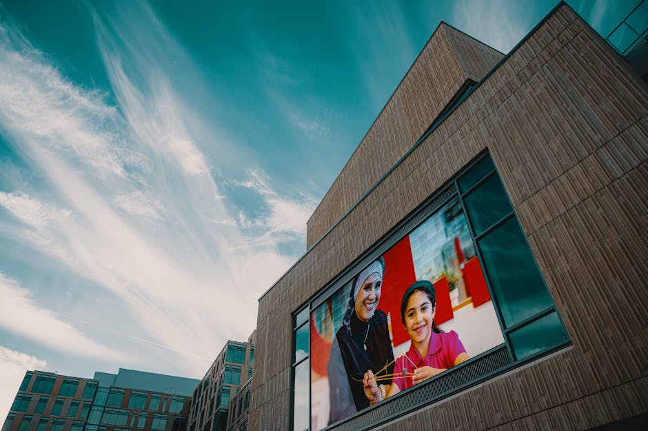 Modern building facade showcasing a large digital screen